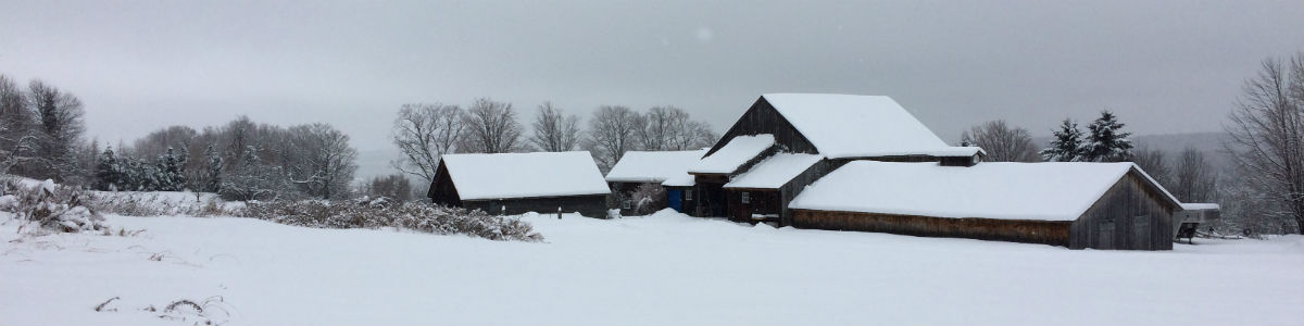 Image of a Farm House and Barn in the Winter